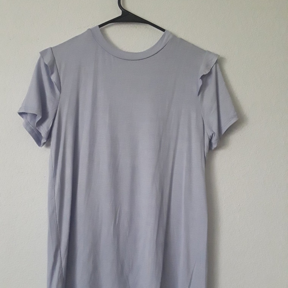 Light Purple T-shirt. Ruffles on the shoulders.